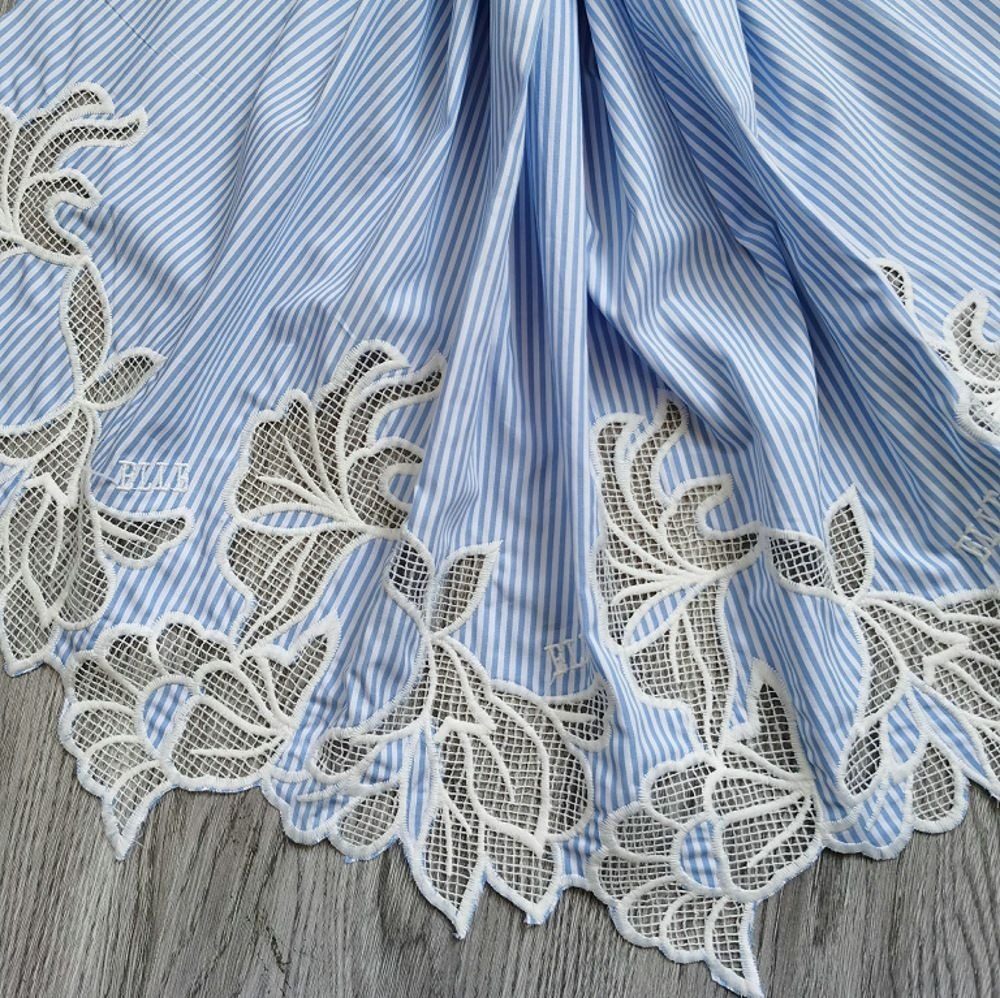 Detailed Schiffli lace pattern